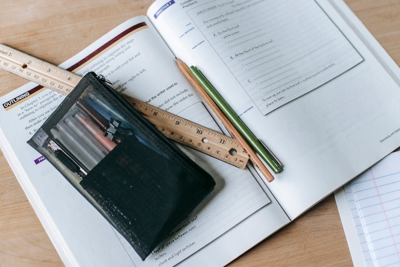 Book with stationery on it